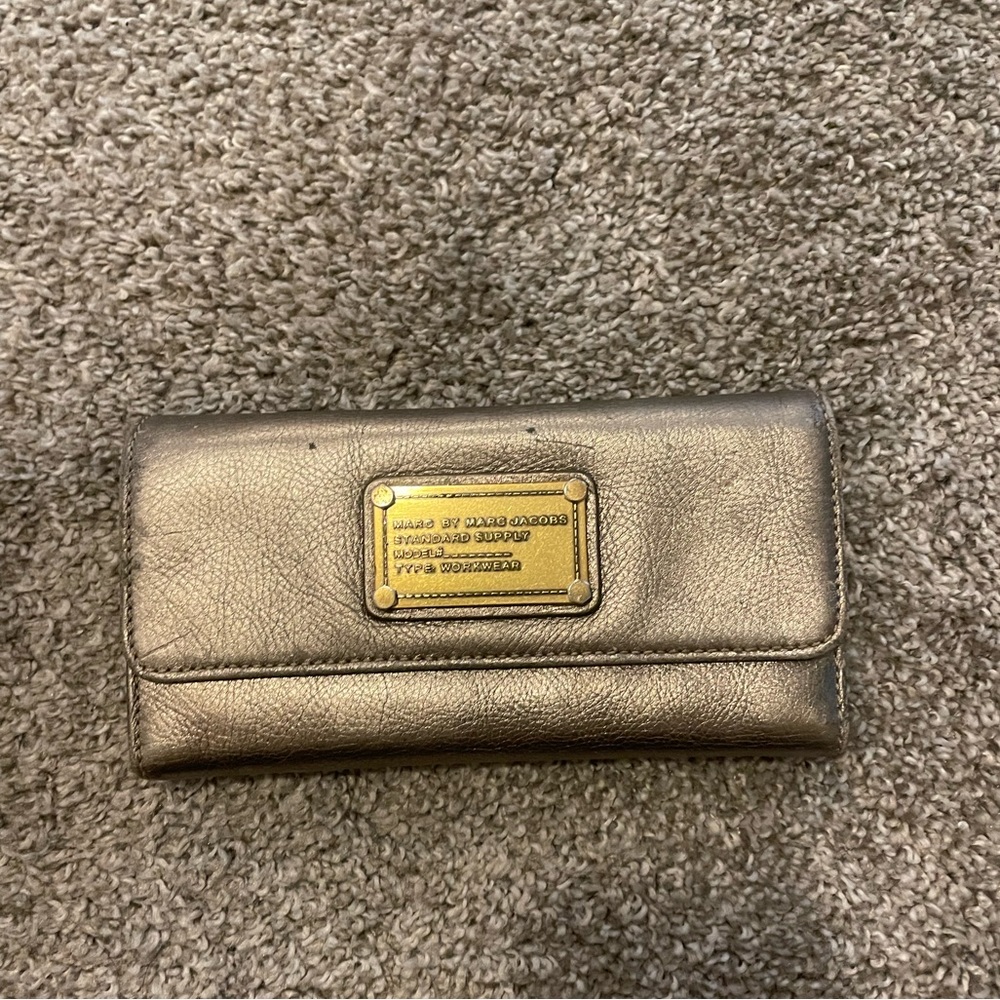 Marc Jacobs metallic wallet. Used. Slightly worn.